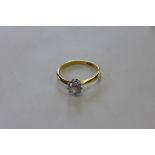 An 18ct yellow gold diamond solitaire ring, diamond approx 0.80ct, ring size P, approx 2.8 grams,