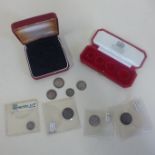 A collection of silver maundy money and boxes
