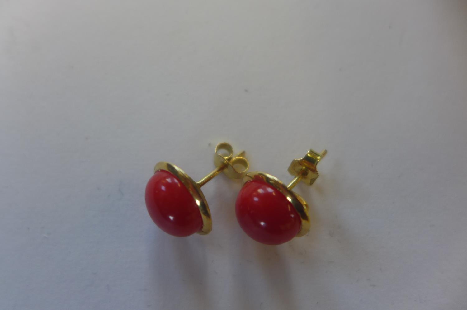 A pair of 18ct coral set earrings, marked 750, approx 2.9 grams, 10mm diameter, generally good - Image 2 of 2