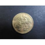 A George IV sovereign, marked Georgius IIII dated 1821 - weight approx 7.9 grams - light surface