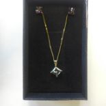 A 9ct yellow gold, mystic topaz pendant and earring set - in generally good condition