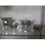 A fine quality Art Deco style silver four piece tea service by Emile Viner for Viners Ltd -