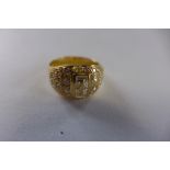 An 18ct yellow gold diamond cushion ring, marked 18K 750, ring size M, diamonds bright, generally