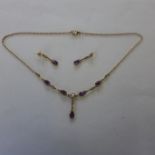 A 9ct gold amethyst and pearl necklace and matching earrings, necklace is 40cm long, earrings 2.