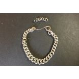 A silver bracelet made from a graduated pocket watch chain, length 21cm, weight approx 45 grams,