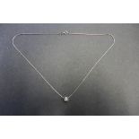 An 18ct white gold hallmarked diamond pendant on a hallmarked white gold necklace, 45cm necklace,