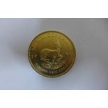 A 1980 fine gold half oz 1/2 Krugerrand coin