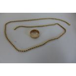 A 9ct yellow gold chain, 61cm long, marked 375 - and a 9ct yellow gold hallmarked ring size Z,