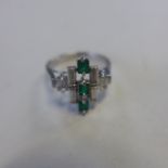 A white gold baguette cut diamond and emerald set ring, in Art Deco style, size N - approx 3.4