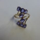 A 9ct hallmarked tanzanite set ring, size Q, approx 3.6 grams, generally good