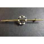 An Edwardian 15ct seed pearl and sapphire brooch, width of brooch 6cm, weight approx 3.6 grams -