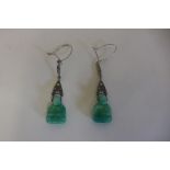 A pair of jade Buddha earrings, 4cm drop