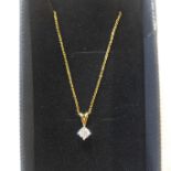 An 18ct yellow gold diamond solitaire pendant on chain - 0.27ct approx - approx 2.2 grams - in