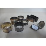 Seven silver napkin rings and a silver pocket watch, not working, weighable silver approx 5.6 troy