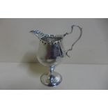 A silver cream jug by Samuel Godbehere and Edward Wiggin, London 1794 - with planished interior,