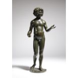 After Conrad Meit (German 16th century). A 19th century bronze figure of Adam, holding an apple in