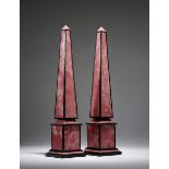 A rare pair of Argentinian pink rhodochrosite and black marble obelisks, of tapering form, each with