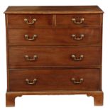 A George III mahogany chest, the top with an applied moulded edge, above two short and three long