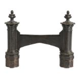 A Victorian cast iron boot scraper, the foliage finials above cluster columns, 38.5cm high, 45.5cm