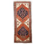 A North West Persia runner, 310 x 114cm.