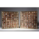 A pair of wall hanging mineral display cases, each containing one hundred numbered mineral