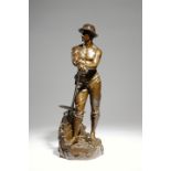 Charles Octave Levy (French 1820-1899). A large bronze figure of a miner, standing bare chested on a