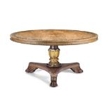 λ A Regency rosewood and brass mounted centre table in the manner of Morel and Seddon,