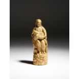 λ An Indo-Portuguese carved ivory group of the Pieta, depicting the Virgin Mary sitting on a rocky