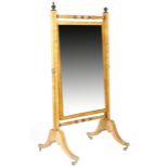 A Victorian satin birch cheval mirror, with ebonised decoration, the rectangular plate between