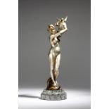 Emmanuel Hannaux (French 1855-1934). An Art Deco cold painted bronze of a naked maiden, holding