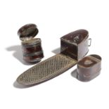 Three rare japanned tole nutmeg graters, one of navette shape, one cylindrical and the other oblong,