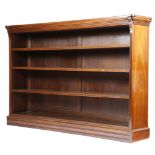 A late Victorian walnut open bookcase, with three adjustable shelves, 121.7cm high, 185.8cm wide,