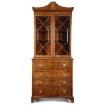 A late George III mahogany secretaire bookcase, inlaid with stringing, the detachable pagoda shape