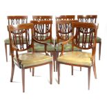 A set of eight Edwardian mahogany and satinwood banded dining chairs, inlaid with boxwood stringing,