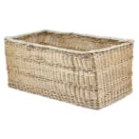 A large country house wicker log bin, 50.8cm high, 139.5cm wide, 87cm deep.