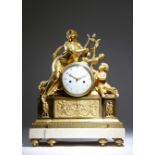 An Empire ormolu mantel clock by de Verberie, the eight day twin train brass cased drum movement,