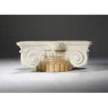 A carved marble Grand Tour Ionic capital fragment, 21.5cm wide. Provenance: The Collection of Sir
