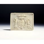 λ A late 18th century ivory snuff box, the hinged lid carved with a coat of arms, with a coronet