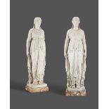 A pair of white marble Grand Tour Greek style caryatid figures, carved in the round in the form of