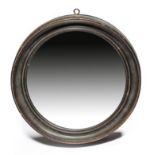 Naval interest. A William IV ebonised concave shaving wall mirror by Jacob Abraham, the circular