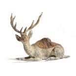 An Austrian cold painted bronze pen wipe, in the form of a recumbent stag with ten-point antlers,