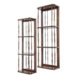 λ A pair of Regency rosewood wall shelves, each with a mirrored back and with three shelves