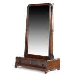 A George II walnut dressing table mirror, the later bevelled plate within a moulded frame, with