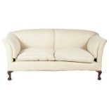 A two seater sofa by Howard & Sons Ltd., later upholstered with ivory lattice design fabric, on