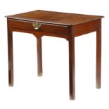 A George II mahogany side table, fitted with a frieze drawer, above a shaped apron and on moulded