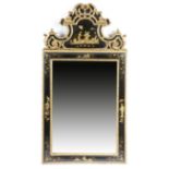 A black japanned and gilt wall mirror in early 18th century style, the rectangular plate within a