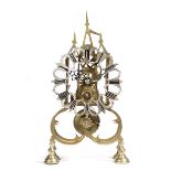 A Victorian brass skeleton clock, the single fusee movement with an anchor escapement, the