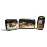 Three late 19th century Russian black lacquer hinged boxes, two painted with troika scenes, the