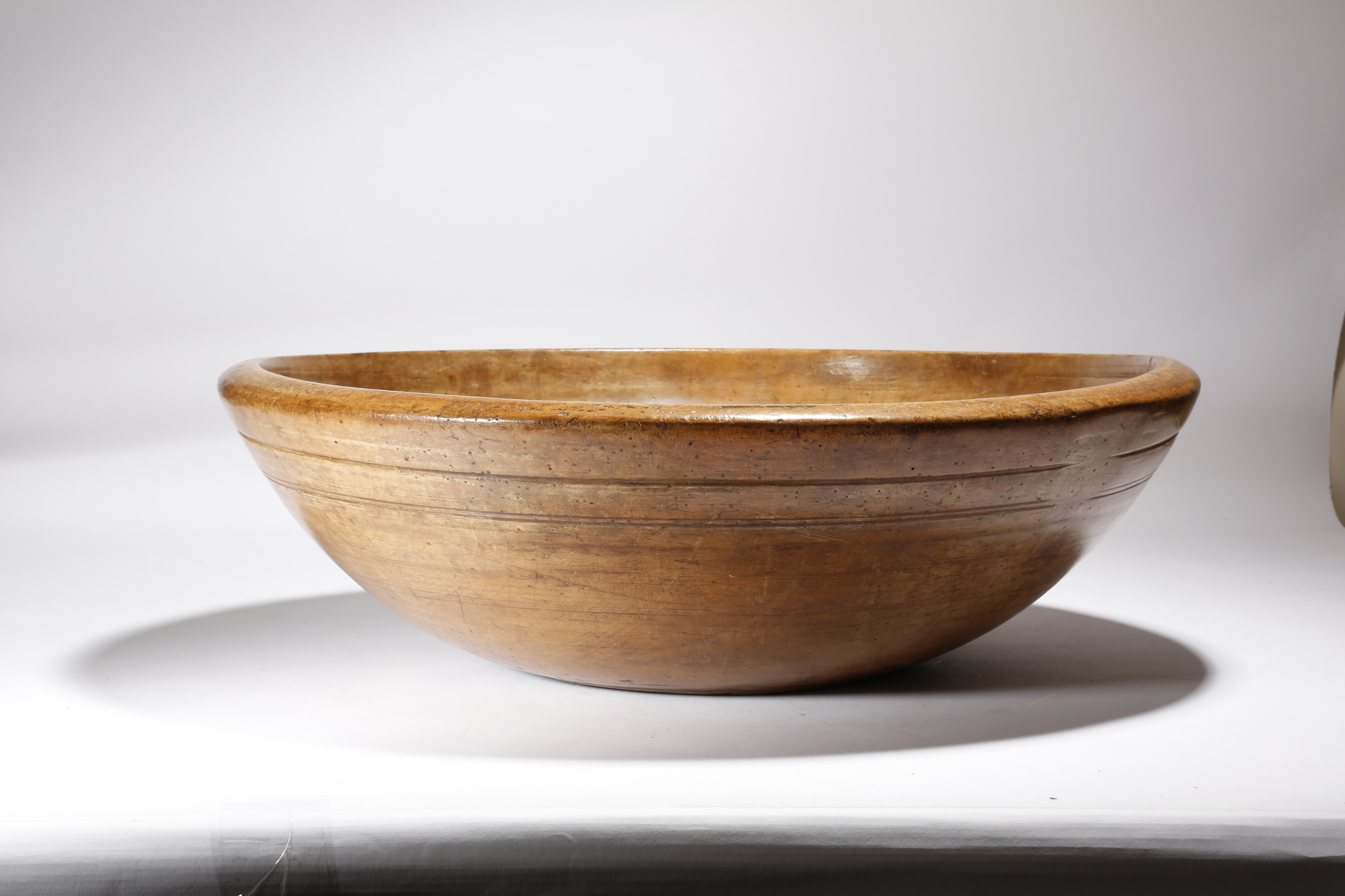 A very large Victorian treen turned sycamore dairy bowl, with reeded bands, 18.7cm high, 60.2cm - Image 2 of 2