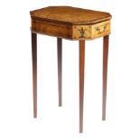 A Regency mahogany sewing table, inlaid with ebonised stringing and marquetry palmettes, the